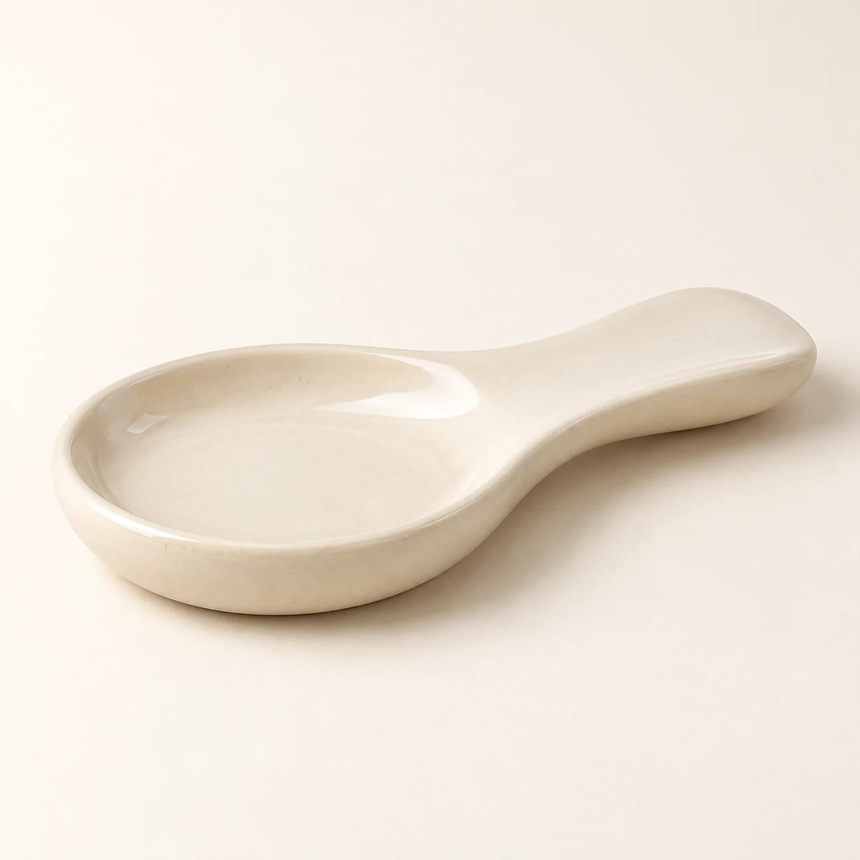 Pebble Ceramic Spoon Rest in Cream